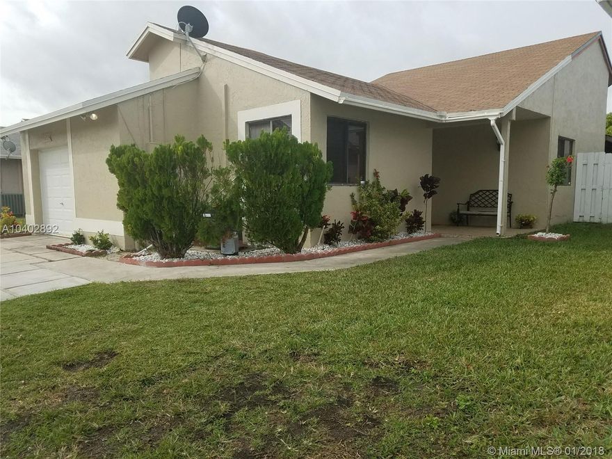 ....COZY 3BR 2BA HOME LOCATED INSIDE THE DESIRABLE WOODBRIDGE COMMUNITY WHICH IS PERFECTLY LOCATED NEAR PEMBROKE LAKES MALL, MEMORIAL HOSPITAL, 1-75 AND THE TURNPIKE.  THIS BEAUTIFUL HOME SHOWS OFF A BRAND NEW KITCHEN WITH GRANITE COUNTER TOPS AND STAINLESS STEEL APPLIANCES, REMODELED BATHROOMS, TILED FLOORS IN THE COMMON AREAS AND LAMINATE WOOD IN THE BEDROOMS.    KITCHEN AND DINING ROOM OPENS UP TO A RELAXING PATIO.  GARAGE IS CONVERTED TO A 4TH BEDROOM AND STORAGE ROOM, CAN BE EASILY RECONVERTED.  GARAGE DOOR IS OPERABLE.