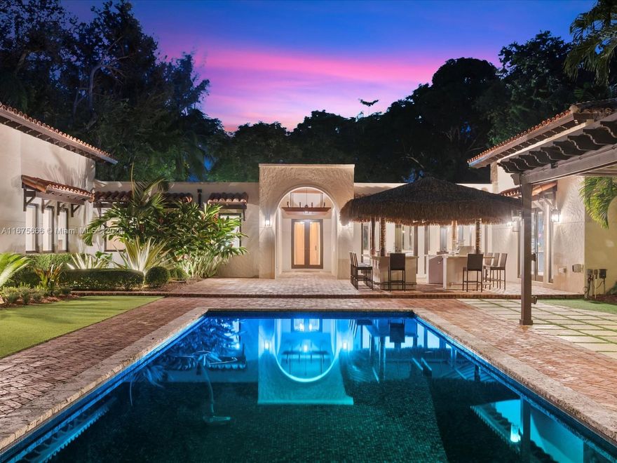 Welcome to this breathtaking, custom Mediterranean contemporary estate, a true masterpiece of luxury living. Crafted with unparalleled attention to detail, the home showcases exquisite millwork, custom cabinetry, and stunning stone finishes throughout. Offering 5 spacious bedrooms and 4 lavish baths, it also features a chef’s kitchen with premium Viking and SubZero appliances. PPG windows and doors infuse the home with natural light. The property includes a car lift, staff wing, and over 22,000 sq. ft. of impeccably landscaped grounds with a custom keystone pool. Elevated 14 ft above sea level and within walking distance to Miami’s top private schools. Schedule your private showing today!