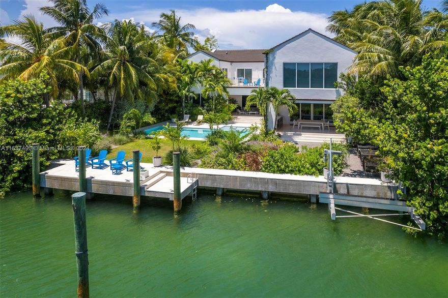 THE FINEST OF NEW WATERFRONT LIVING. 6 BEDROOMS AND 6 BATHS AND 2 HALF BATHS IN OVER 10,000 SQUARE FEET ON THE PINES CANAL LOT OF 18,600 SQUARE FEET. CUSTOM BUILT IN 2018 WITH ALL THE CUSTOM UPGRADES YOU CAN THINK OF, INCLUDING A 15,000 CAPACITY BOAT LIFT, A PRIVATE DOCK, FULL HOUSE 110K W GENERATOR WITH AUTOMATIC TRANSFER SWITCH, CONTROL4 SMART HOME SYSTEM, CONCRETE ROOF, HIGH CEILINGS, ITALKRAFT KITCHEN WITH HIGH END APPLIANCES FEATURING INDUCTION AND GAS AND 4 OVENS AND A FULL ITALKRAFT CATERING /PREP KITCHEN, WINE CELLAR, TWO ITALKRAFT LAUNDRY ROOMS (ONE UPSTAIRS, ONE DOWNSTAIRS), TWO COVERED PATIOS WITH AUTOMATIC SCREENS, HOME IS ELEVATOR READY, LARGE GARAGE WITH AC AND SEPARATE GOLF CART GARAGE, CENTRAL VACUUM SYSTEM, FULL HOUSE ELECTRICAL THROUGH CONDUIT, AND SO MUCH MORE.