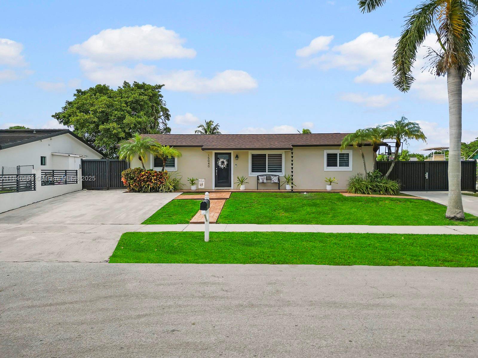 Discover your dream home in this highly sought-after neighborhood, offering the ultimate South Florida lifestyle. This meticulously maintained 3-bedroom, 2-bathroom residence boasts a spacious and inviting layout, perfect for modern living. Enjoy peace of mind with a brand new roof and a new AC system, providing efficiency and worry-free living for years to come.The expansive lot offers ample room for both a boat and an RV, a rare find in this prime location. Entertain guests effortlessly in your dedicated outdoor entertainment area, designed for memorable al fresco dining and celebrations. You'll be just moments away from a variety of shopping plazas and grocery stores, making errands a breeze. Plus, with minutes to the Florida Keys.
