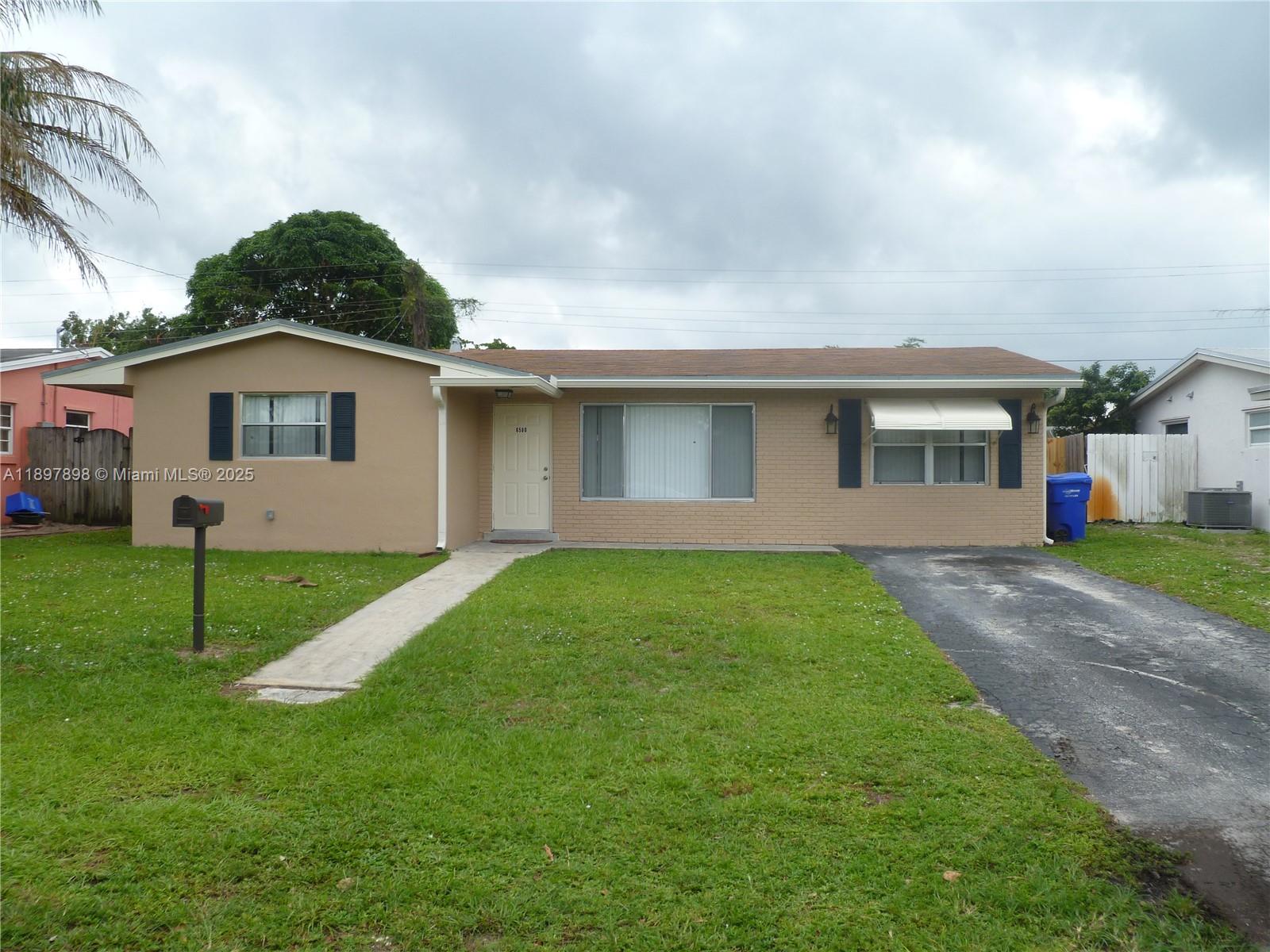 AVAILABLE DECEMBER 15 Beautiful rental property, spacious 3/1 with laundry room. fenced yard. updated kitchen/bath. central a/c unit. quiet well maintained street, central Hollywood location. photos taken at time of move-in. this rental property shows extremely well.