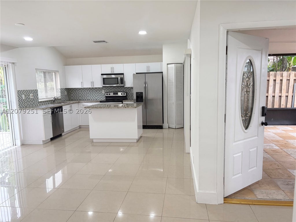 Photo of 720 NW 132nd Ter, Plantation, FL 33325 (MLS # A12079251)
