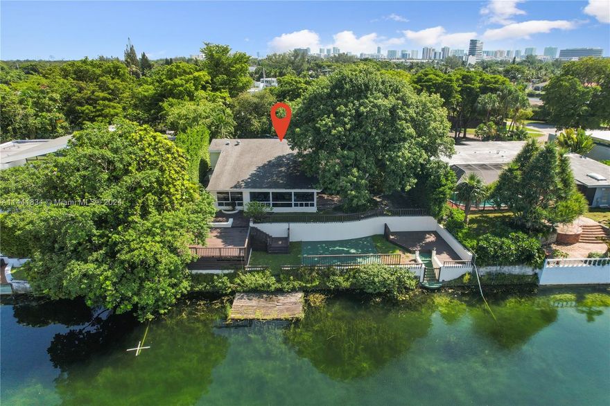 Welcome to your lakeside dream on Sky Lake's serene shores. This 1982 rebuilt lakefront property offers 3500 sq. ft. of contemporary living space. From the living area and master bedroom, behold the stunning lake views. The backyard boasts an upper wood deck and lower patio, offering the potential for a sandy beach. Enjoy direct lake access for swimming and kayaking creating cherished moments. Located in Sky Lake community, you'll have  access to urban amenities, shopping, dining, and top schools. Excellent highway connectivity ensures a smooth commute to the city center, business districts, parks and walking trails. Don't miss the opportunity to make this exquisite lakefront residence your forever home. Contact us today to schedule your private tour! "Available now."