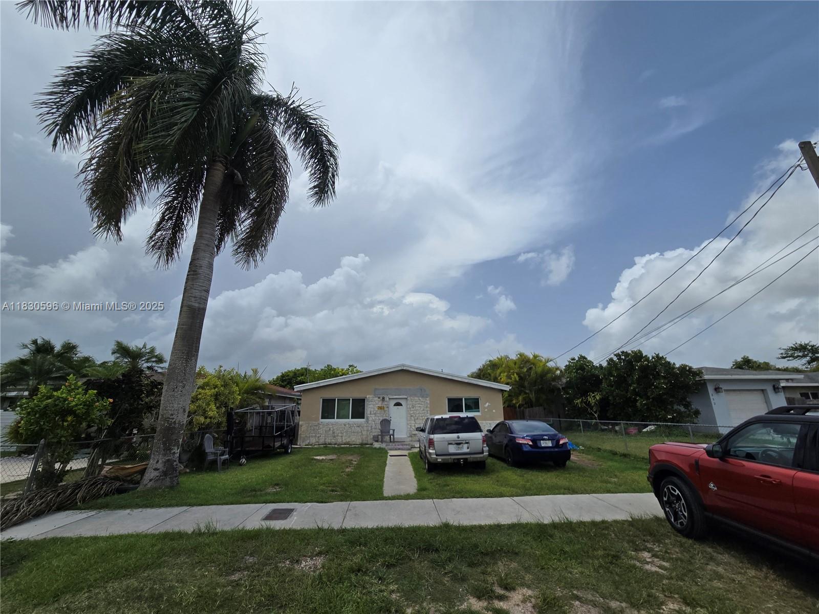 Investor Alert! or First Home Buyer Discover this income-producing property in Florida City featuring a 3-bed/1-bath main home, a separate 1/1 efficiency, and a rentable trailer—all on a spacious 7,500 sq ft lot just minutes from the Turnpike. The main home includes impact windows and doors, a roof only 6 years old, and a generous backyard. With just a few finishing touches, this property can shine. Ideal for investors or multigenerational living. Don’t miss this opportunity with strong rental potential in a growing area!