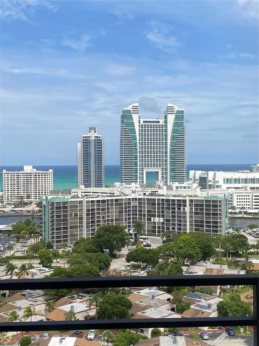 Olympus Towers, 21st fl. 1 bed, 1.5 bath, East view. Skyline & ocean vistas! Full amenities: gym, sauna, 4 tennis, pickleball, marina, pool, BBQ, car wash, storage (same floor). Quiet, beautiful, secured. 24/7 lobby security. Great Three Islands location. Walk to park & beach. Lease & Sale. 1 garage parking + extra for a fee. Internet included.