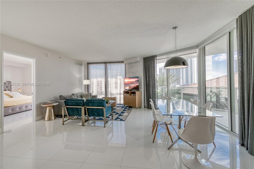Location location location, on Collins Ave! There are partial ocean views in this beautiful 3 bedroom / 2 bath featuring partial water/city views. It is fully furnished, with impact glass windows, a large wrap-around balcony, a walk-in closet, and a fully equipped open kitchen. Basic cable & water included, washer/dryer in unit. It is turn-key and ready to move in! Canal access & one block from the ocean. The building offers great amenities like a clubhouse, gym, spa, pool, private beach club membership, and 24-hour valet/security services. 1 assigned parking space, plus valet parking. The building also has a pedestrian promenade with small shops including restaurants, spas, a pet store/grooming & a park across the street.