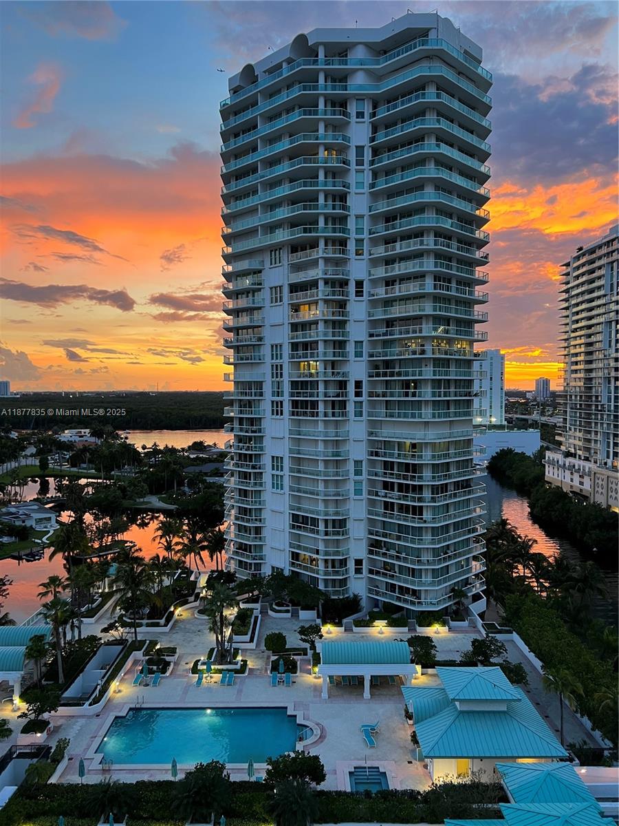 Beautiful west view in Sunny Isles Beach.
This 2 bedroom and 1 den unit has 2 bathrooms. The second bathroom is also the guest bathroom.
There is a laundry inside this bathroom.
The balcony is quite wide and spacious. The sunset view is spectacular.
Amenities such as Gym and Tennis courts.
Swimming pool is currently being renovated and it will be gorgeous.