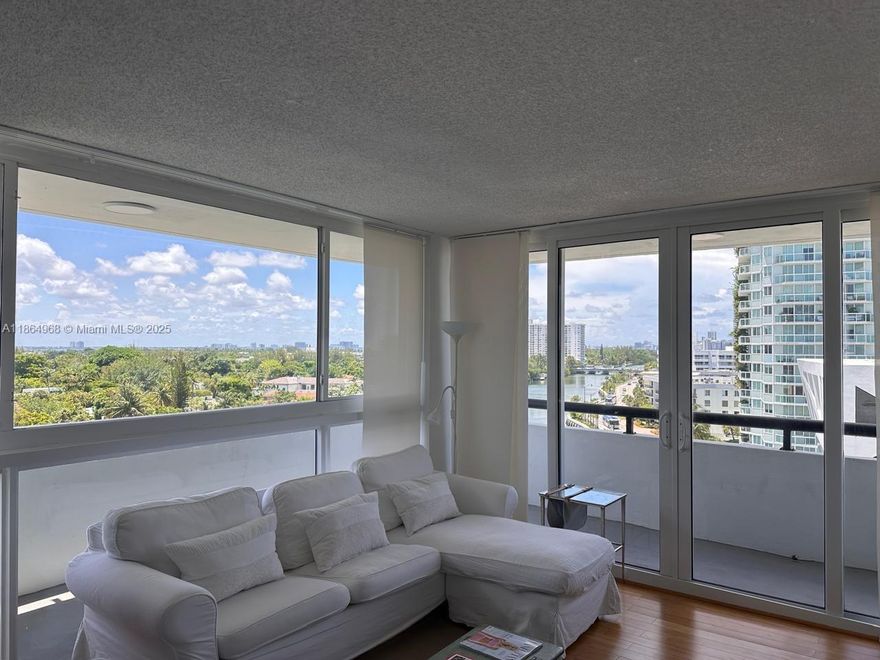 Beautiful, fully furnished 2Bed/2Bath corner unit in Mid-Beach with breathtaking canal, city, and ocean views from a large wraparound balcony. This updated residence features elegant wood floors throughout, floor-to-ceiling impact-resistant glass windows, and a custom walk-in closet.
EXCELLENT LOCATION near 41st Street and directly across from the beach and Faena. Includes 1 assigned covered parking space.
Portugal Towers offers top amenities: pool, gym, jacuzzi, 24-hour security, and more! Walk to vibrant South Beach, Lincoln Road Mall, cafés, and restaurants. Conveniently close to A+ schools, Mt. Sinai Hospital, and just a 20-minute drive to Miami International Airport.