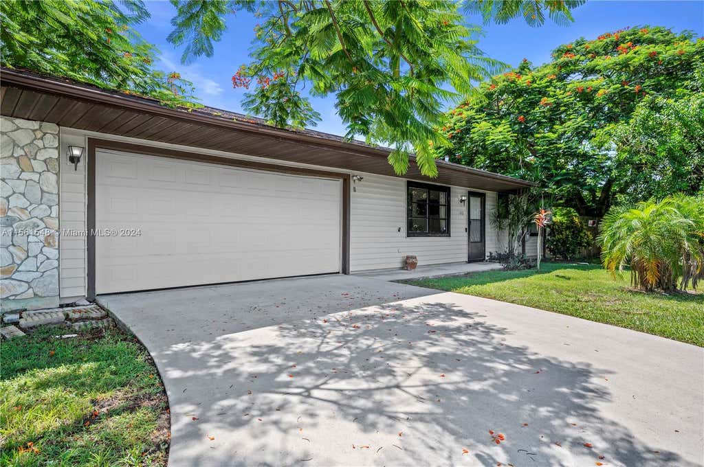 Photo of 102 SE Whitmore Dr, Port Saint Lucie, FL 34984 (MLS # A11561548)