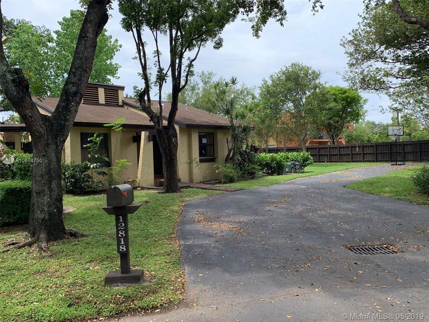 This corner townhouse is centrally located near schools shops and major highways.  It has an extra parking area and the rear faces an open field adjacent to the community pool.