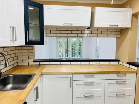 Photo of 8000 Fairview Dr #310, Tamarac, FL 33321 (MLS # A11952556)