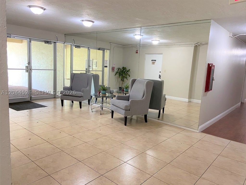 Photo of 7300 NW 17th St #210, Plantation, FL 33313 (MLS # A12044526)