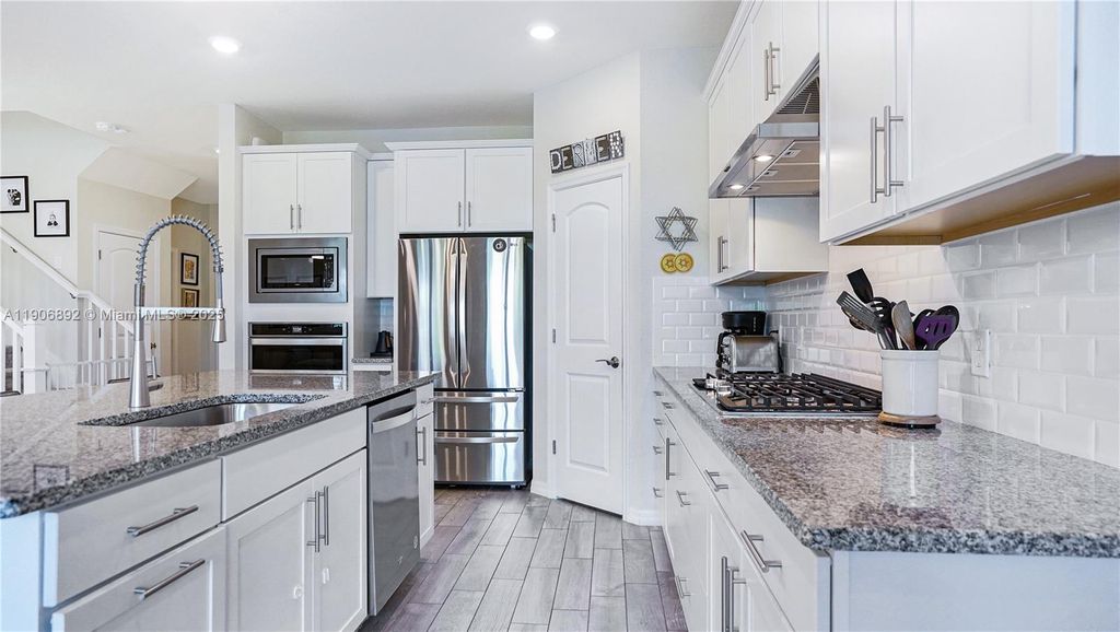 Photo of 8605 Patron Ln, Lake Worth, FL 33467 (MLS # A11906892)