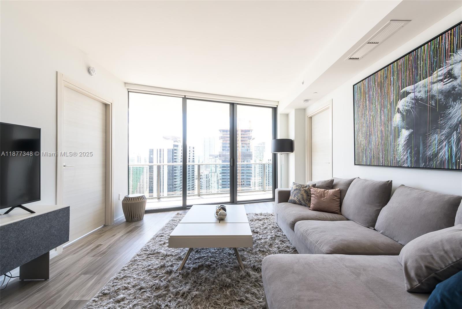 Spectacular fully furnished 2-bedroom + den, 2.5-bath residence with private elevator at the exclusive SLS LUX Brickell. This unit offers stunning views from an oversized balcony and features top-of-the-line Bosch, Wolf, and Sub-Zero appliances, along with electric blinds throughout. Enjoy full access to five-star hotel amenities including a rooftop pool, full-service spa, fitness center, poolside bar, tennis court, mini golf, children’s playroom, room service, on-site restaurants, and more. Ideally located just steps from Brickell City Centre, Mary Brickell Village, Equinox, and some of the city's best restaurants. Includes 2 assigned parking spaces (parking lift), with cable TV and Wi-Fi included. No pets.