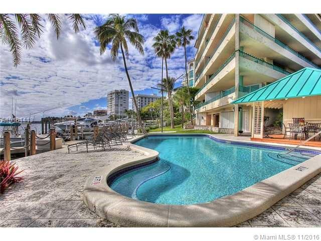 What a location ! Fabulous Bayfront views, fully furnished 1 bedroom unit, spacious patio and bedroom balcony. Updated kitchen with stainless steel appliances and wood cabinets. Travertine floors/bath with Jacuzzi tub. Desk space in bedroom. Complex has heated pool with spa. Washer/dryer in unit. Emergency generator and fire sprinklers. Agent - owner