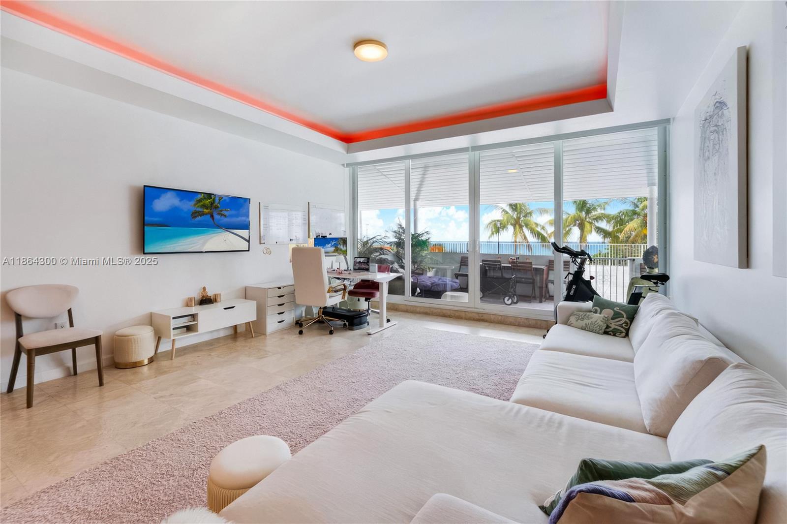Rare oceanfront lanai at The Pavilion, Miami Beach. Oversized 1BR+den/2BA, 1,335 SF with private terrace and direct beach walk access. Renovated: quartz kitchen, brass fixtures, marble floors. Den functions as 2nd bedroom/office. Washer/dryer, storage room. Full-service building: pool, gym, 24/7 security, valet. 1 assigned parking. Minimum 1 month rentals. Pet-friendly. Prime Mid-Beach location near Faena, Edition, Soho House