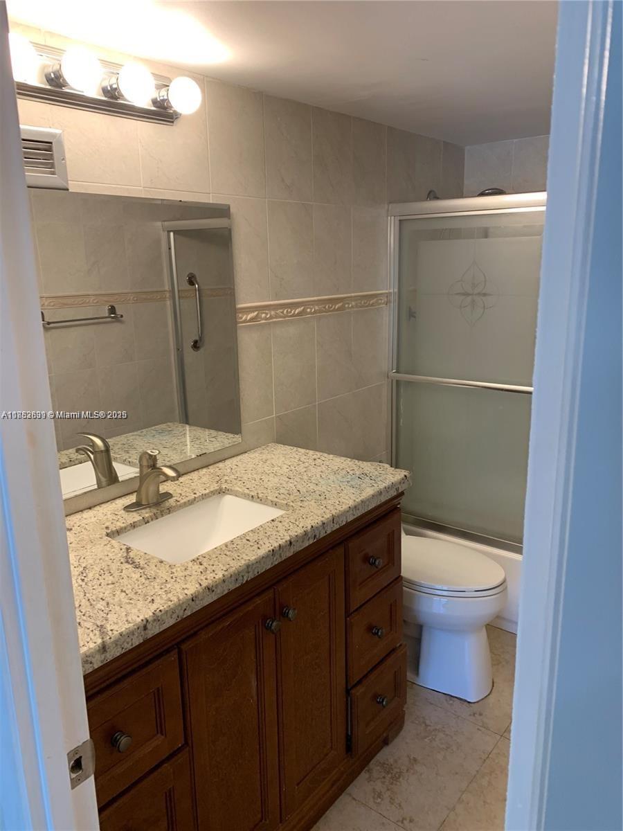 9800 W Bay Harbor Dr 206