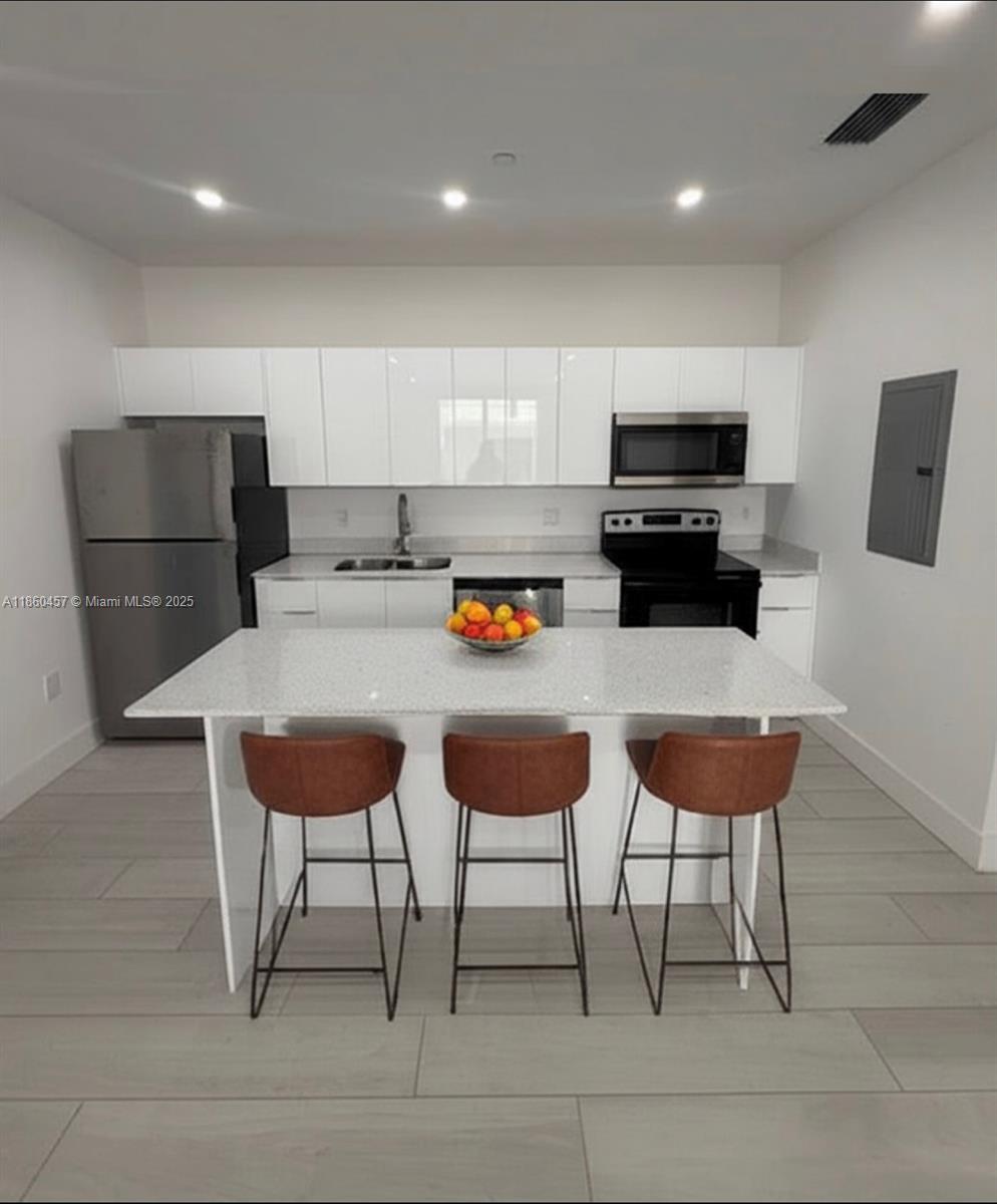 Be the first one to live in this brand new 2-bedroom 2-bathroom apartment located in Hialeah! Promotion: $2,600 per month with the first month free on a 15-month lease. State of the Art Building with 12 brand-new 2-bedroom, 2-bathroom apartments ready to move in. Credit 620+: 1st month + 1 month security deposit. Credit 619 or less: 1st month + 2 months' security deposit. Each apartment features In-Unit Washer & Dryer, Stainless Steel Appliances, and Granite Countertops. Building is Pet-friendly and has a high-speed Elevator and secured code access lobby. Exciting New Urban Area with Metro Rail & Tri-Rail Stations one block away. Free Bus and Private Car Service within the City of Hialeah! Schedule your tour today! Text/call listing agent for showing.