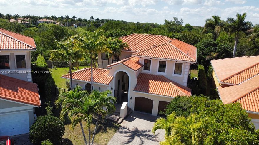 Varese Model, Updated and Marvelous family home located in a secluded area and quiet gated community of Cutler Cay. Main house has five spacious bedrooms and open common areas, large lot 11,477. Spacious kitchen, family room and living room. This model has a detached guest house attached 1/1 which is a perfect for an office, in-laws' quarter, or maids quarter or a playroom. Three A/C units soaring ceilings, gorgeous landscaping, including fruit trees, oversized lot and totally fenced in backyard patio. The Club house provides, pool, spa, sauna, private gym him and hers, tennis, basketball courts.