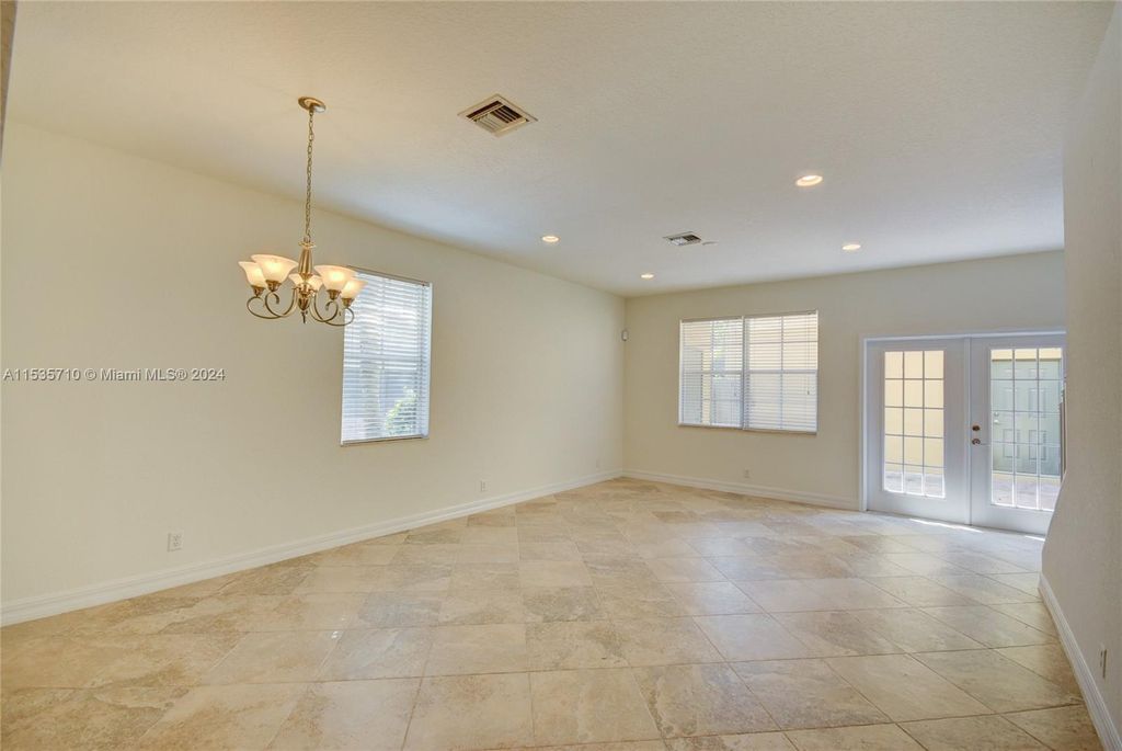 Photo of 110 E Pigeon Plum Dr #101, Jupiter, FL 33458 (MLS # A11535710)