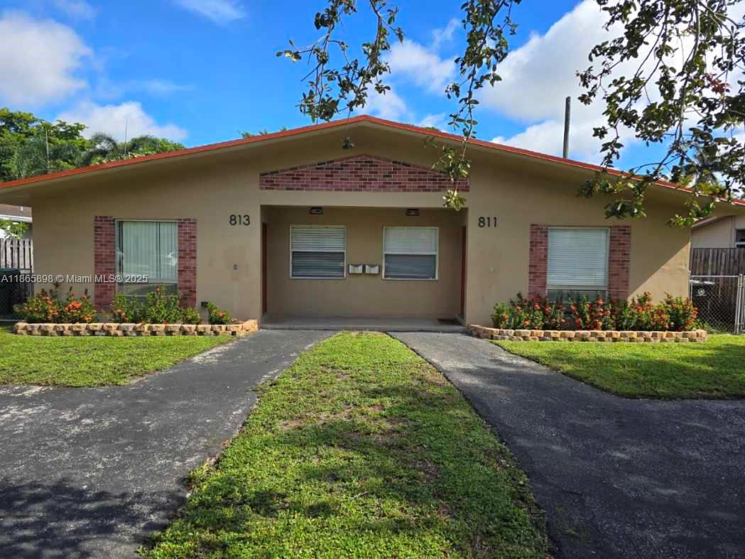 Bright- Clean - very updated, -updated kitchen with stainless appliances, new washer and dryer in the unit, big fenced yard with patio- pet friendly, large bedrooms- great storage with extra storage room, blinds through out- new A/C, bathroom with double sink, ready to move in-