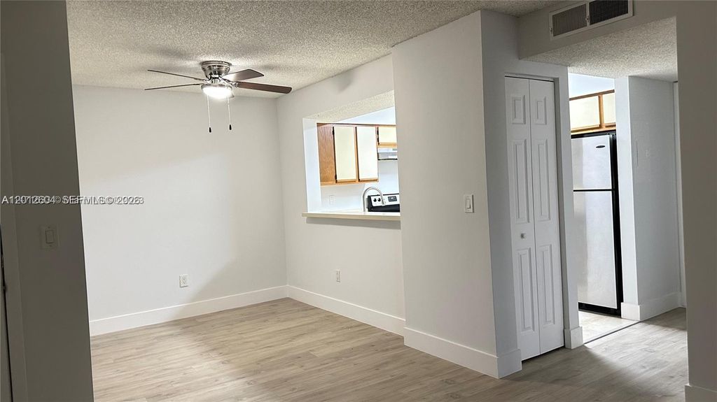 Photo of 1243 SW 46th Ave #1111, Pompano Beach, FL 33069 (MLS # A12012604)