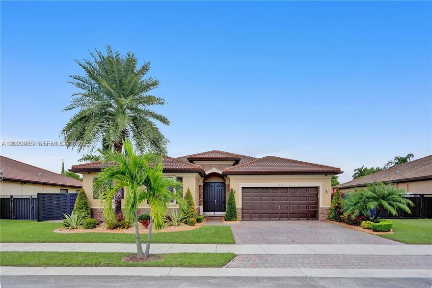 Beautiful 4/3 single-family home on an oversized lot with a spectacular backyard. Features include a freeform salt- water pool, travertine deck, tiki hut, and professional landscaping. Mediterranean-style exterior with stone façade, keyless entry, 2-car garage, accordion shutters, pavers, concrete borders, and side yard with room for a boat. Inside, you’ll find a welcoming foyer, formal living and dining areas, tile throughout with wood flooring in the bedrooms, separate laundry room, volume ceilings, crown moldings, and plantation shutters. The spacious upgraded kitchen offers granite countertops, stainless steel appliances, breakfast area, and an island snack bar. This one won’t last! Motivated Seller!! Make an Offer! Submit all offers via MLS Offers Owner Listed