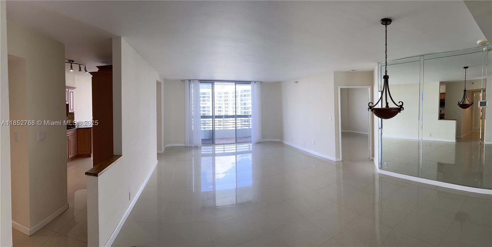 South Florida living at its finest! Experience breathtaking Intracoastal views from this spacious 2-bedroom, 2-bath condo in the prestigious Mystic Pointe in the heart of Aventura. This sun-drenched residence boasts floor to-ceiling windows, a generous master suite with spectacular views. This split-bedroom floor plan offers privacy, complemented by ample closet space and an in-unit washer and dryer. Large living room and a separate dining area. Enjoy resort-style amenities including a waterfront pool, tennis, pickleball courts, a gym, marina, dog park, on-site restaurant, and 24/7 security. Perfectly positioned just minutes from Aventura Mall, Sunny Isles Beach stunning beaches, fine dining, golf courses, and major International airports. Low HOA. Tenant occ. Easy to Show. Call today!