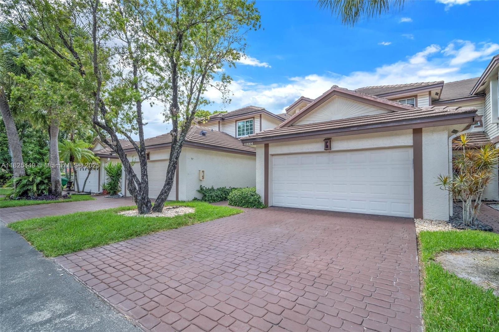 Beautifully updated and Best-Priced townhouse in the community, located in a prime Coral Springs area! This spacious residence features a renovated kitchen with elegant quartz countertops, rich wooden cabinetry, and brand-new stainless steel appliances. Bathrooms have also been tastefully updated, and the home includes a newer AC system and roof, both replaced about five years ago. One of the bedrooms has been opened into a versatile loft space, perfect for a home office or den. The HOA covers the roof, building insurance, and more, offering added peace of mind. Ideally situated just minutes from top rated schools, Coral Square Mall, dining, parks, and major highways. Seller is motivated!