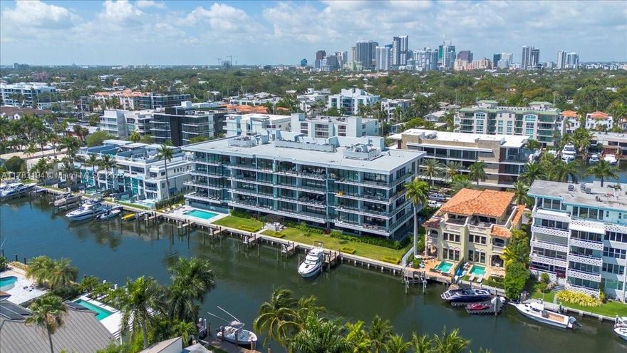 Be the first to live in this high-floor residence at the newly built 160 Marina Bay—an exclusive ultra-luxury waterfront condominium. Boat slip included!  Enjoy highly coveted east-facing views over the Las Olas Isles and the lush landscaping of multi-million dollar estates—not west-facing into multi-family buildings. This 3-bed, 3.5-bath flow-through residence offers over 3,300+ Total SF, 10' ceilings, private elevator lobby, Italian cabinetry, high-end appliances, built-in dining bar, and an expansive waterfront terrace. Centrally located within walking distance of downtown Las Olas and the beach: the perfect blend of beach and city! Directly on the stunning waterways of the "Venice of America" with no fixed bridges. Move-in ready. Low HOA fees!