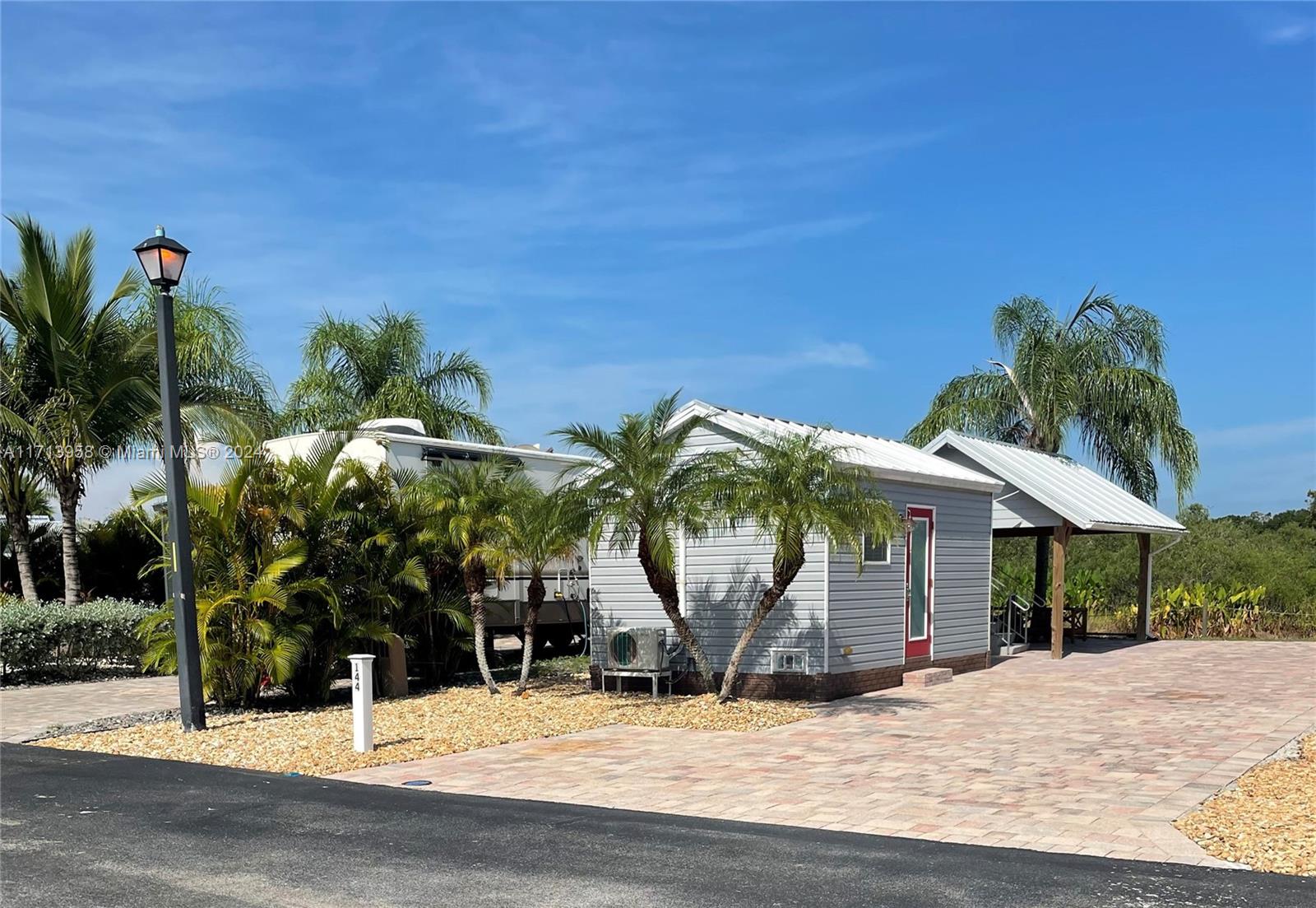 Premium Lot with Exceptional Features Discover the ultimate retreat at this beautiful lot situated on the reserve in Silver Palms RV Resort. This property is perfect for luxury living, boasting a finished casita, a charming tiki hut, exquisite landscaping, and paver surfaces that create a seamless outdoor living space. Silver Palms offers an unparalleled array of amenities, including: A clubhouse with organized activities. Resort-style swimming pool and Jacuzzi. Recreational facilities. Social opportunities like gatherings, dances, and live entertainment. A Tiki Bar serving lunch and drinks by the poolside. Enjoy an oasis of comfort and community, with every detail designed for both relaxation and recreation. This lot is the perfect combination of serene privacy and vibrant social life.