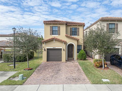 Photo of 5203 NW 50th Ter, Tamarac, FL 33319 (MLS # A11956261)