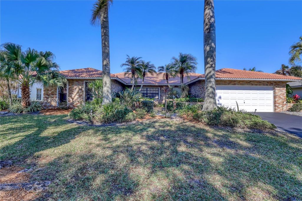 Photo of 1048 NW 110th Ln, Coral Springs, FL 33071 (MLS # A11977270)