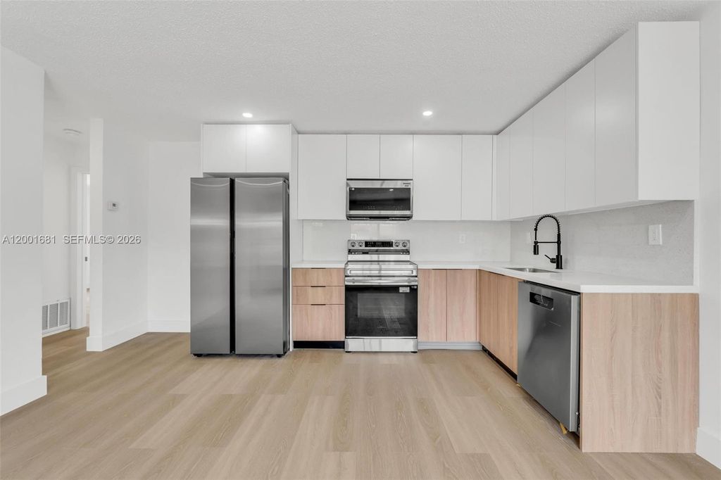 Photo of 1611 NE 50th Ct #1, Fort Lauderdale, FL 33334 (MLS # A12001681)