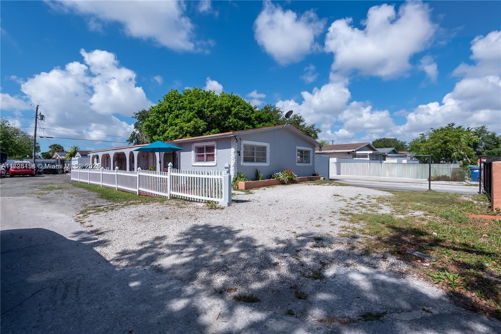 Unique opportunity in the heart of Miami! This incredible duplex property offers not only comfort and space but also unmatched potential for investors and families. With enough space to park at least 15 cars, almost all impact windows and a new fence, plus another fully equipped room for guests or family with independent entrance. This property is ready to offer security and tranquility. Prime location just 10 minutes from Westland Mall and all the shops and businesses of 49 St. 10 minutes from Miami Shores and 5 minutes from I-95. Near supermarket. -Development potential: Zoning allows the construction of up to 9 units, perfect for investors. This property represents a perfect opportunity for a solid investment or place to live.and receive profits.