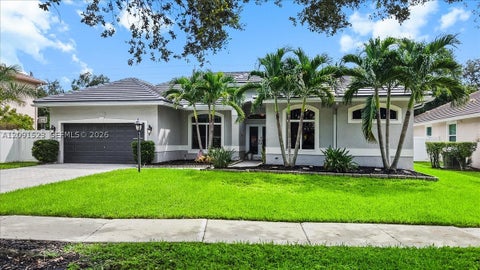Photo of 6982 Coronado Way, Pembroke Pines, FL 33331 (MLS # A12091523)
