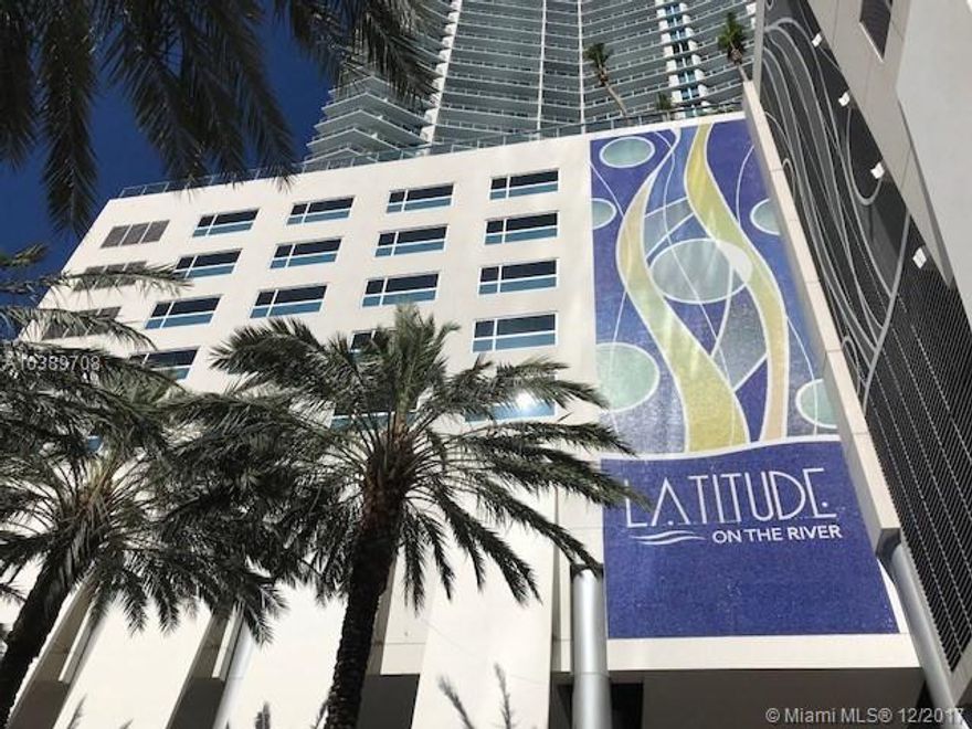 Beautiful 1 bedroom, 1 bath condo located in Latitude on the River.  This condo features tile and marble floors throughout.  Contemporary kitchen with bright white cabinets,  stainless appliances and granite counter tops.  Large living /  dining area.  Guest bathroom.  Interior laundry room with washer and dryer.  Large master bedroom and walk-in closet, luxurious master bath.  Stunning city and water views.