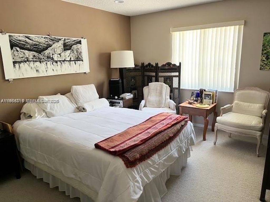 Photo of 4619 Palmbrooke Cir, West Palm Beach, FL 33417 (MLS # A11968019)