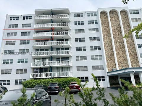 Photo of 401 NE 14th Ave #602, Hallandale Beach, FL 33009 (MLS # A12063822)