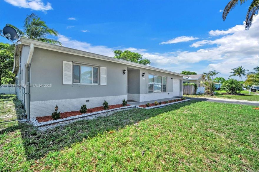 Beautiful 4 Bed 3 bath Spacious home is newly & tastefully renovated. Open floor layout with vinyl laminate flooring throughout, spacious kitchen with granite counter tops,kitchen bar eating or dining area. Roomy double closets in the master bedroom with a renovated & reimagined private bathroom. Living room & dining room areas are great for a large family. Freshly painted inside and out, brand new recessed lighting, and washer dryer. Private Street with no drive through traffic. Great neighborhood that centrally located minutes from the beach, 95 expressway, shopping, entertainment, and hospital. Prime Pompano Beach Area that is great investment now and for the future. Gated back yard for privacy, family fun.Garage, front porch, plenty of front & back yard for pool. Call today!