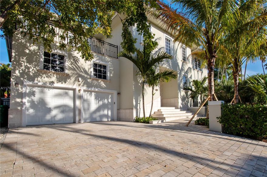 Escape to this private oasis with this exquisite 6-bedroom, 7.5-bath residence on the island of Key Biscayne. Set on a premier 9,873 sq. ft. corner lot—expanding to approximately 11,000 sq. ft. including the easement—this home epitomizes luxury, offering seclusion and abundant space to live the Florida lifestyle to its fullest. Indoors, every detail speaks to elegance, from the Italian Scavolini kitchen outfitted with Miele and Subzero appliances to dual wine coolers for effortless entertaining. The refined architectural design radiates timeless sophistication, creating a sanctuary where style meets island charm. Discover the allure of Key Biscayne living—arrange a private viewing today and experience this tranquil paradise firsthand.