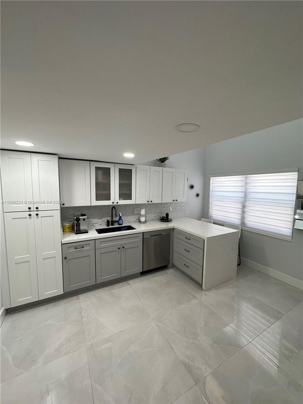 Photo of 931 SW 112th Ter #061, Pembroke Pines, FL 33025 (MLS # A11688224)