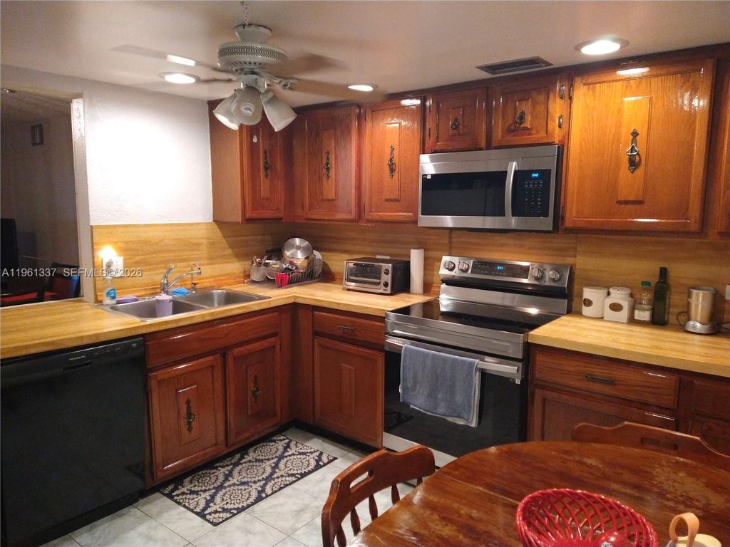 Photo of 7554 Stirling Rd #105, Davie, FL 33024 (MLS # A11961337)