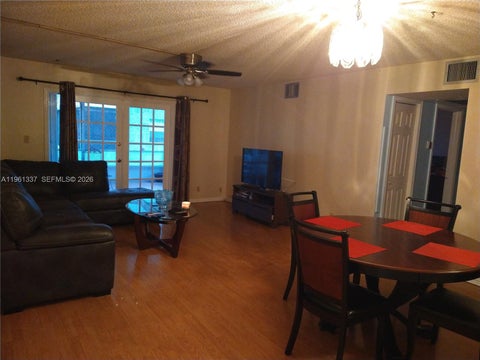 Photo of 7554 Stirling Rd #105, Davie, FL 33024 (MLS # A11961337)