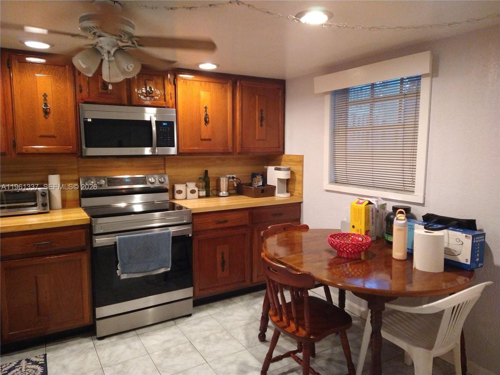 Photo of 7554 Stirling Rd #105, Davie, FL 33024 (MLS # A11961337)