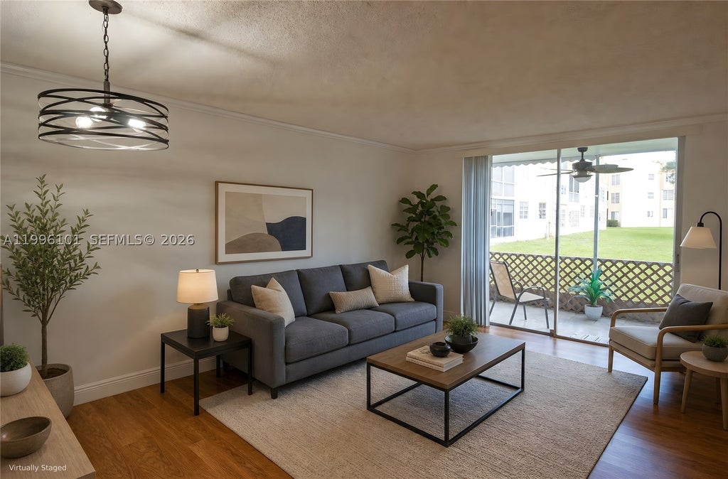 Photo of 6020 NW 64th Ave #108, Tamarac, FL 33319 (MLS # A11996101)