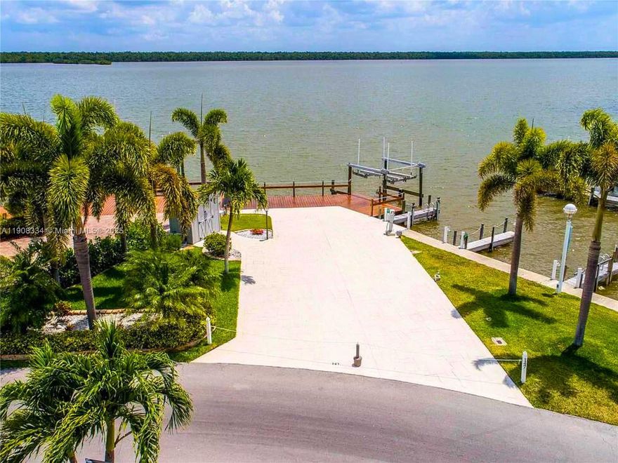 Luxurious Waterfront Corner RV Lot in a Tropical Island Paradise! Discover this rare & private point lot, offering a personal boat lift, fish cleaning station & breathtaking views of Chokoloskee Bay—perfect for RV enthusiasts & fishermen. Unparalleled privacy with only 1 neighbor. Direct access to Gulf of Mexico, backcountry, world-class fishing & Everglades National Park. Resort amenities include 3 pools, 3 hot tubs, tennis/pickleball, fitness center & a welcoming community. This extra-large lot features full hookups, room for 3 vehicles, lush landscaping, freshly resurfaced pavement & newly painted dock. Quarterly HOA fees cover lawn care, Wi-Fi, cable & more. NO INSURANCE REQUIRED! Contact the listing agent today for full details (too much to list) and secure this exceptional property!