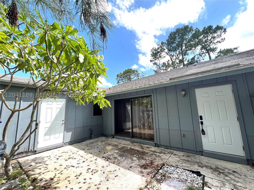 Photo of 1077 Goldenrod Rd #1077, Wellington, FL 33414 (MLS # A12041189)