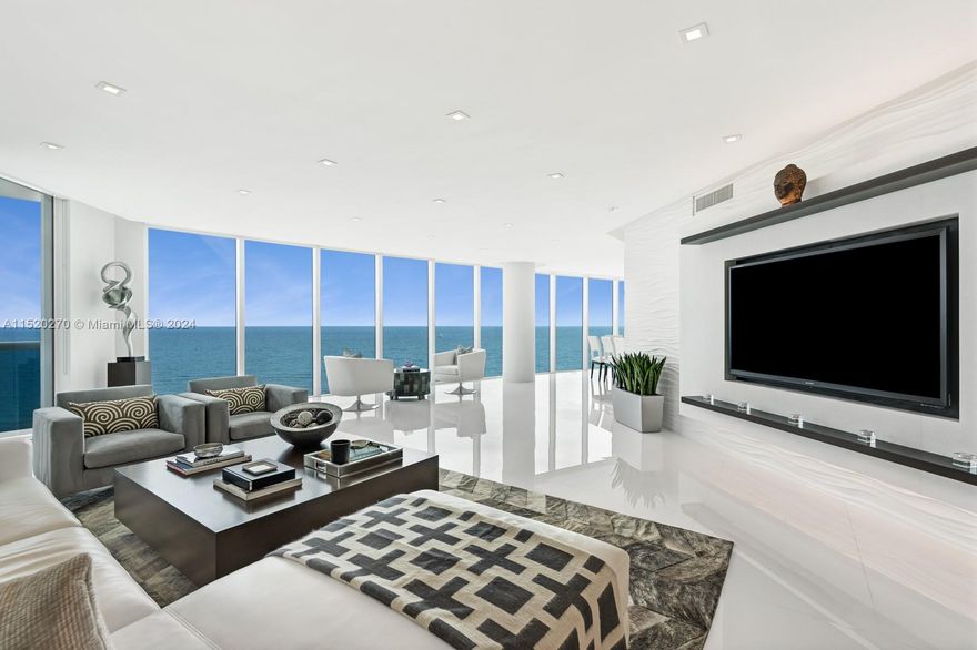 Experience oceanfront living at its finest from this NE Corner 3 Bedroom Residence at Trump Hollywood. Enjoy 3,062 SF of living space and modern interiors which feature white glass flooring throughout, a large chefs kitchen with top of the line Miele Appliances, oversized en suite bedrooms, spacious laundry room and sweeping ocean views from a large terrace. A private elevator opens to your own foyer and inside you’re greeted by endless ocean views from every room. Trump Hollywood Residents have access to 5 star resort style amenities including pool and beach service, lunch restaurant, spa, fitness center, tennis and pickleball courts, movie theater, valet, concierge and more.