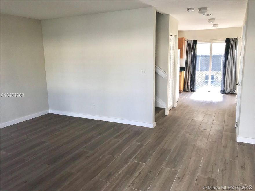 Mediterranean style two-level  town - home/condo in gated community . Home consists of 3.0 bedrooms, 2.5 bathrooms, open living space. Tile floor just installed and freshly painted.